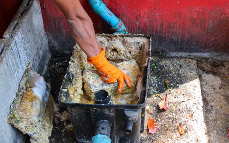 Cleaning a grease trap